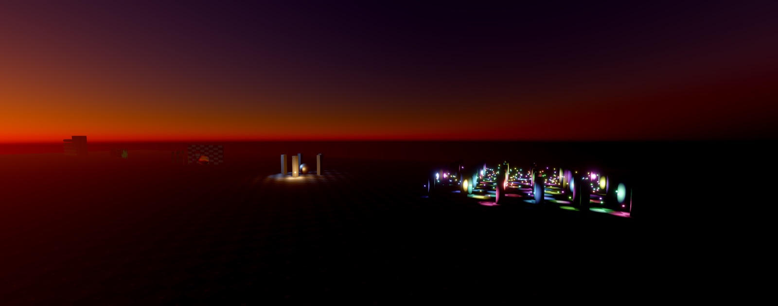 Colored lights glowing through distance fog under a red sunset sky